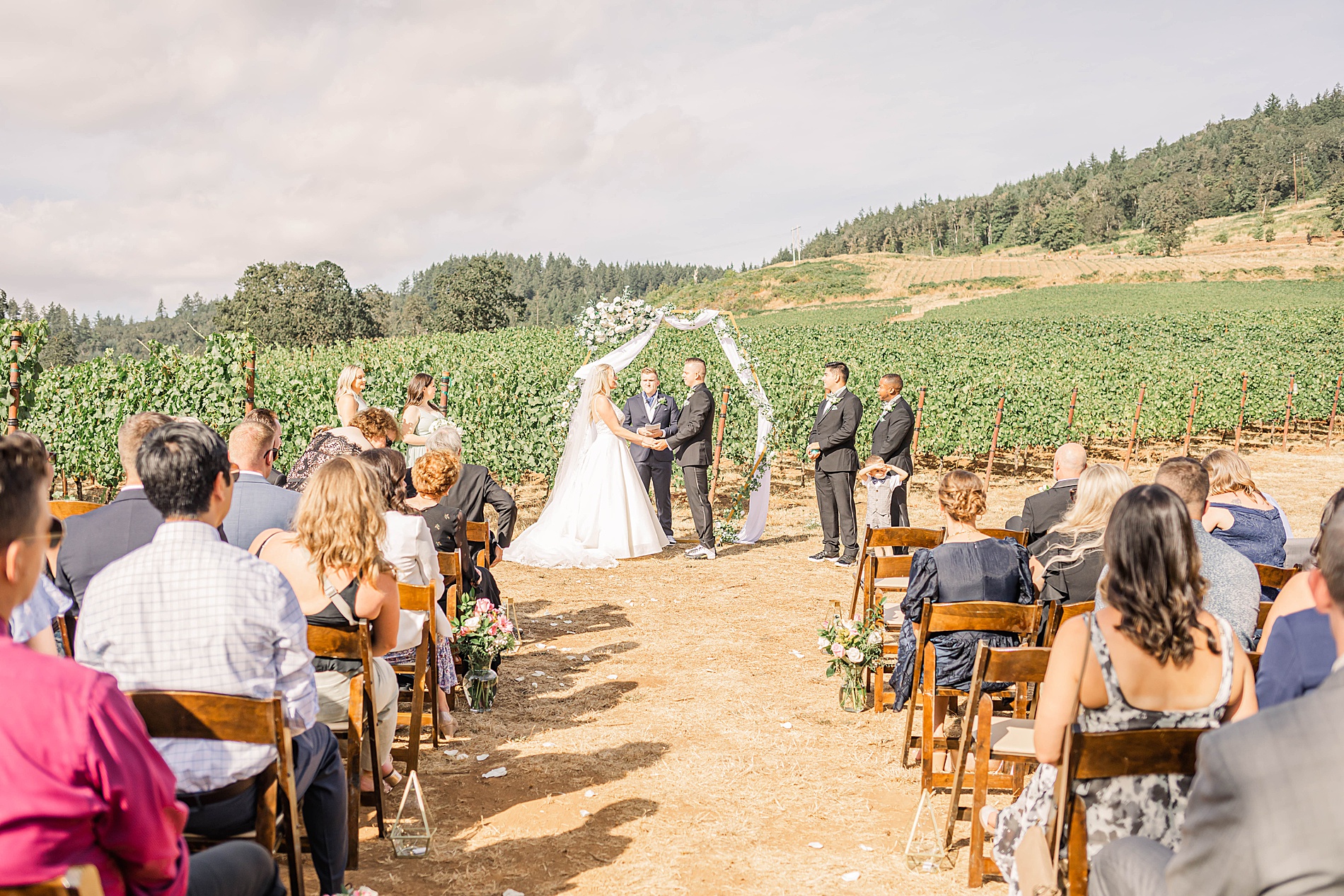 outdoor wedding ceremony in vineyard
