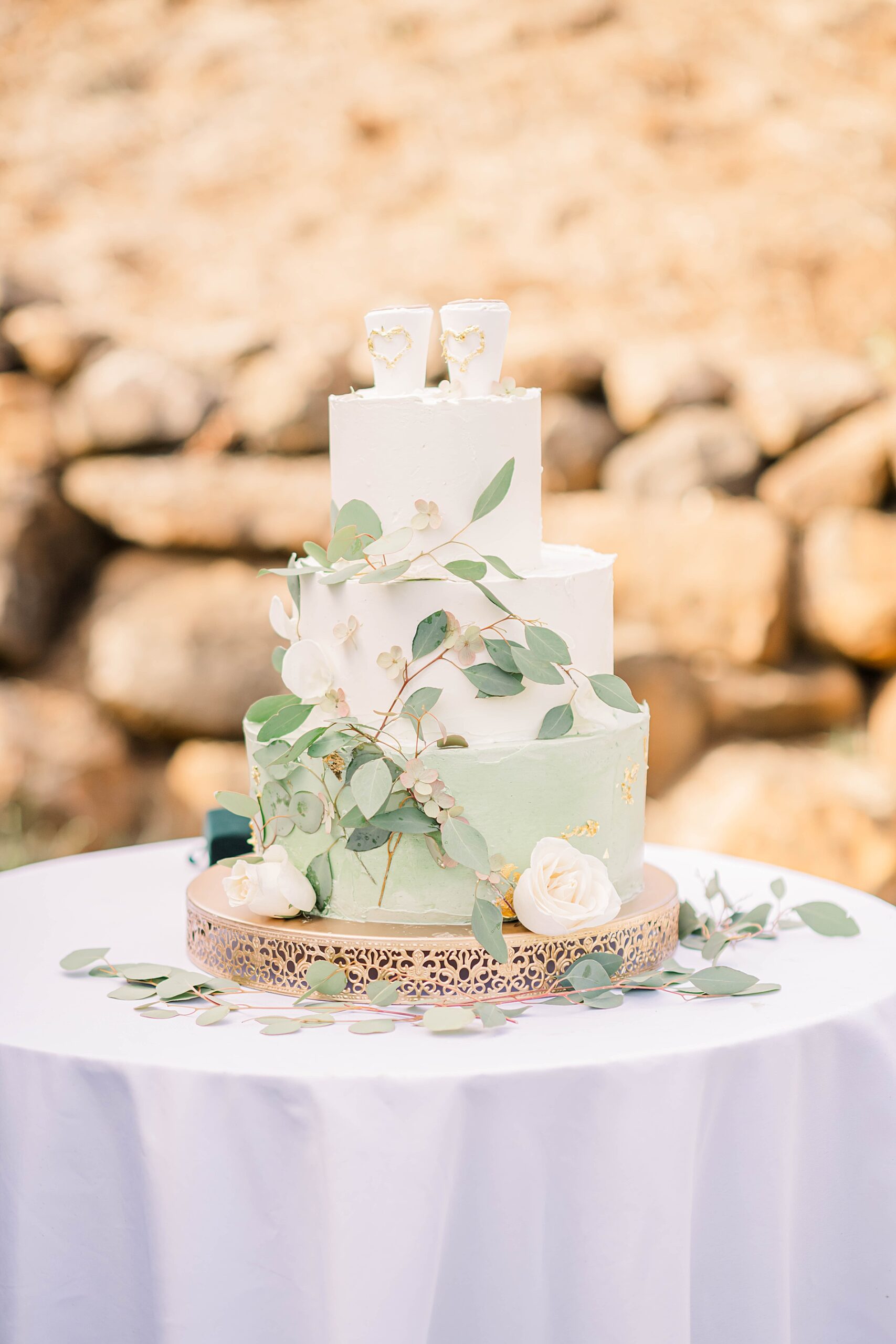 wedding cake with sage green layer 