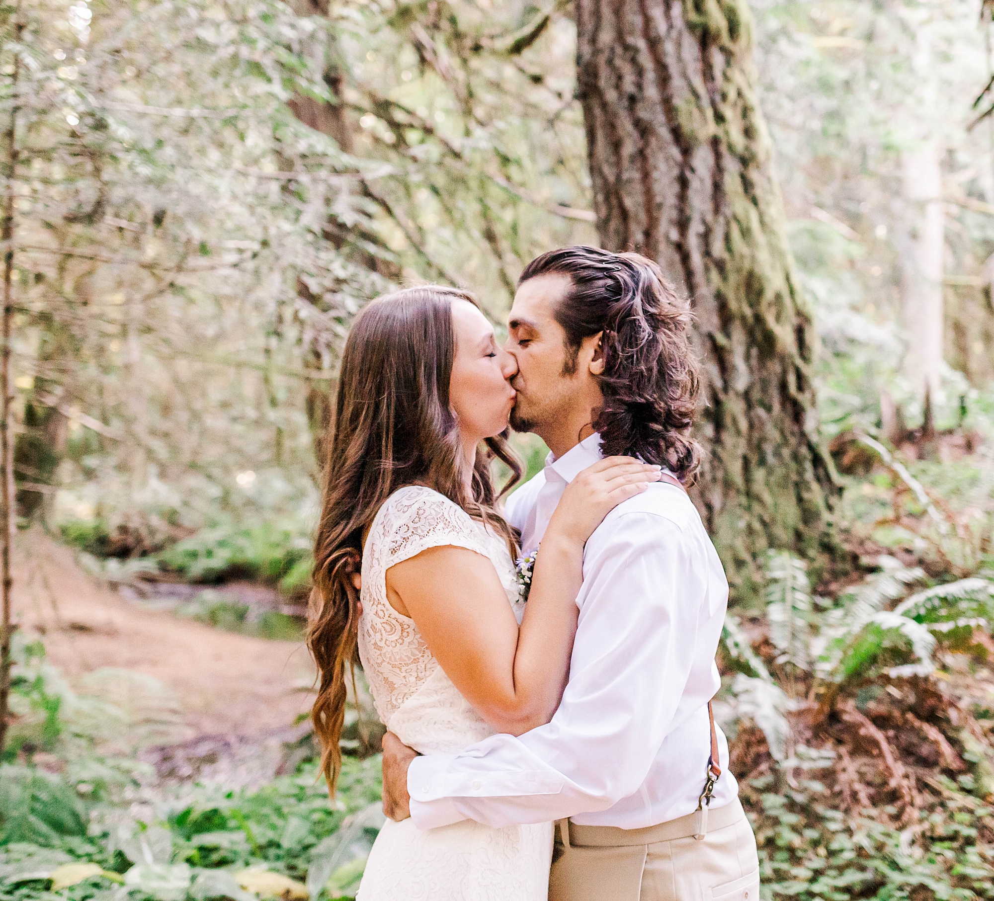 newlyweds kiss after Intimate Wedding Ceremony in Estacada, Oregon