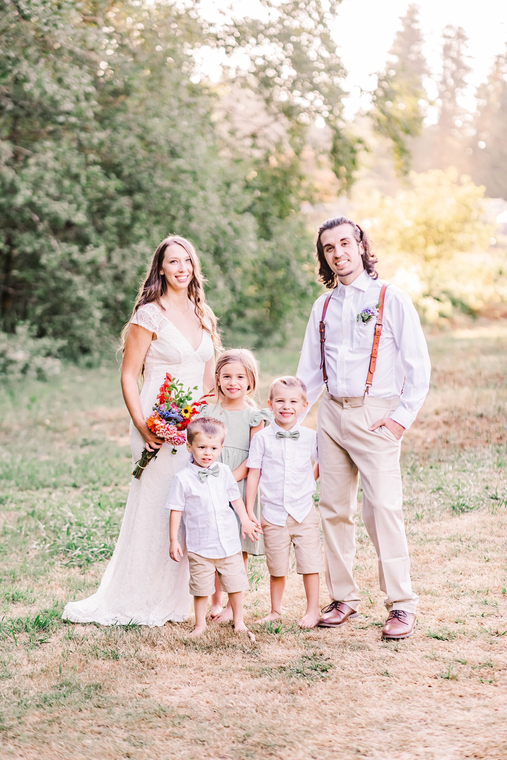 bride and groom with their kids