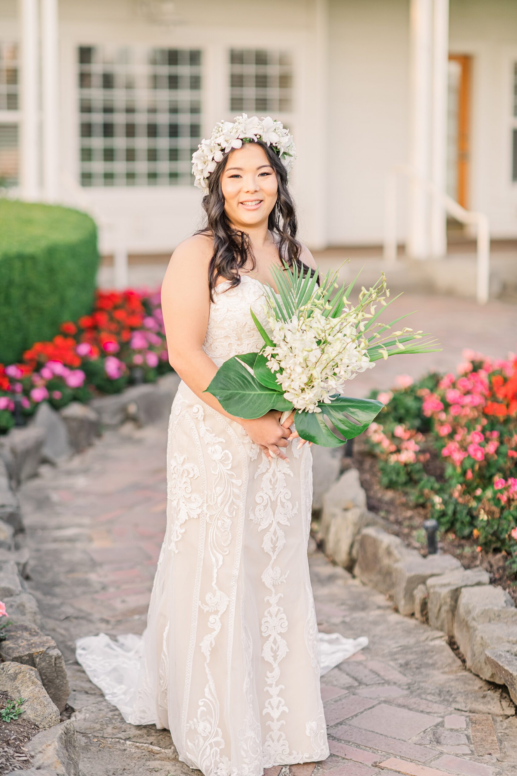 Bridal portraits holding Hawaiian flower bouquet 