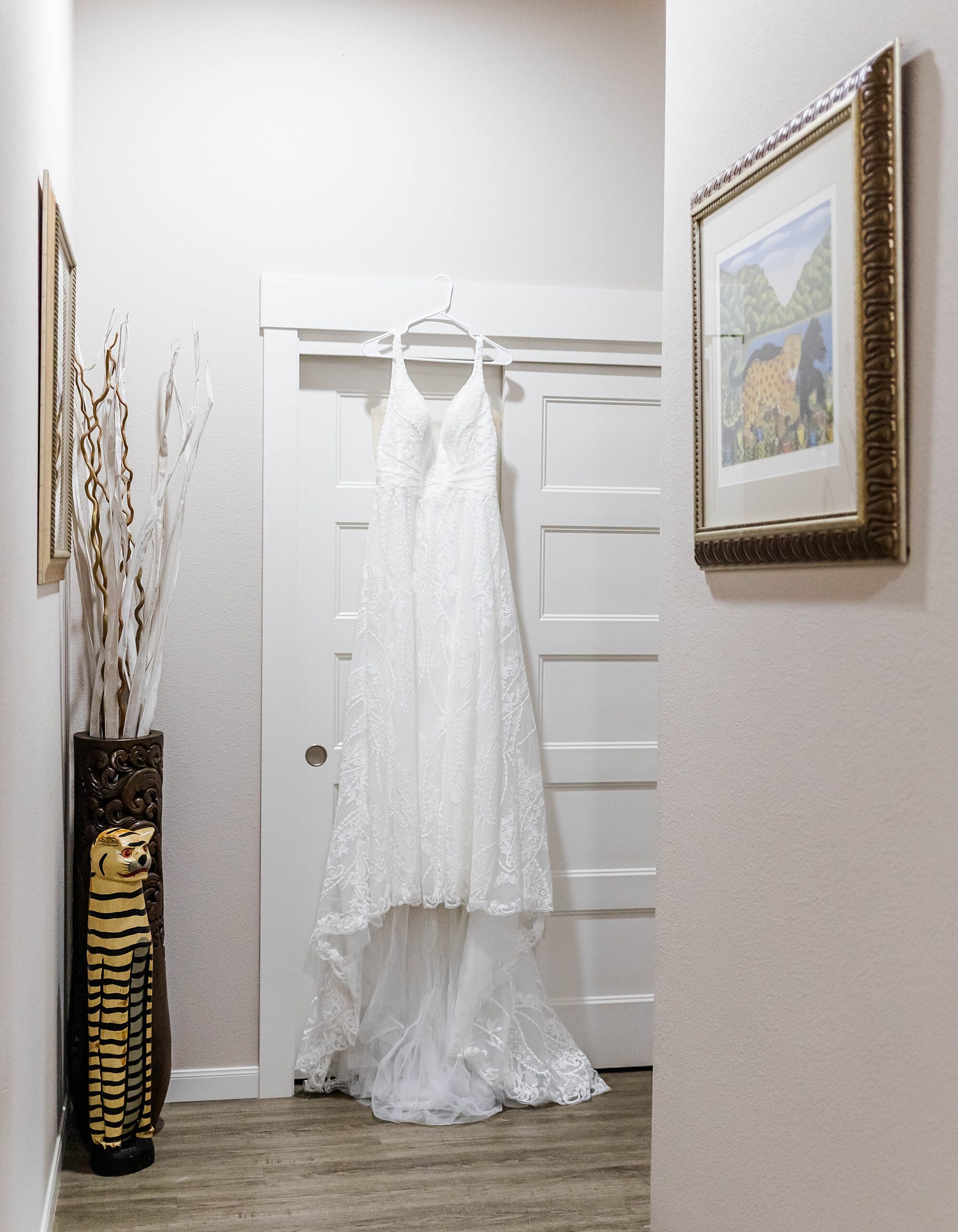 wedding dress hanging door frame
