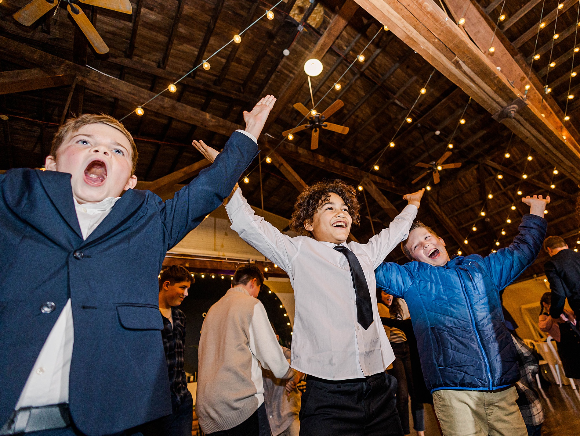 kids have fun on dance floor at wedding reception 